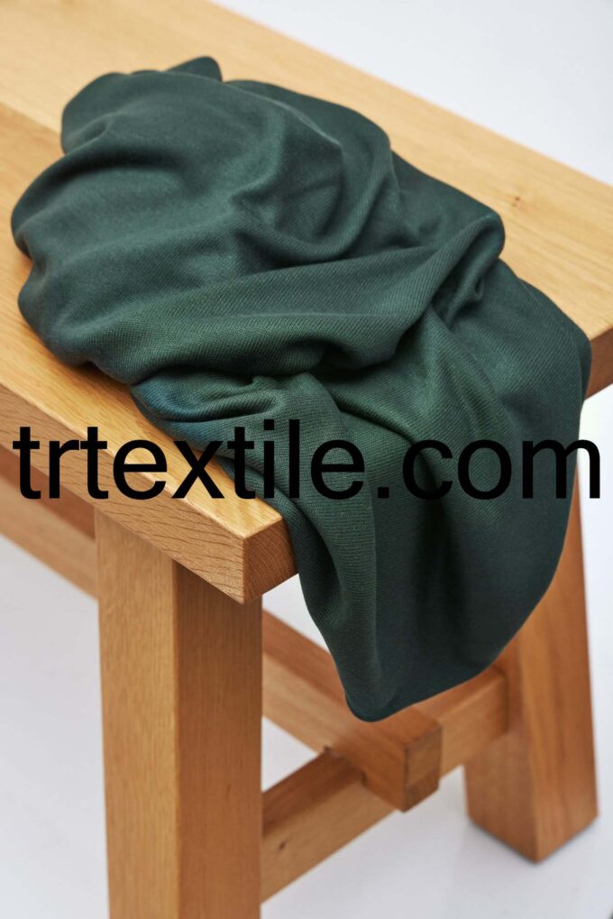 dark green knitwear fabric - trtextile.com image