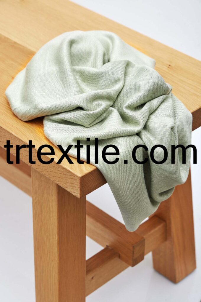 light green knitwear fabric - trtextile.com image