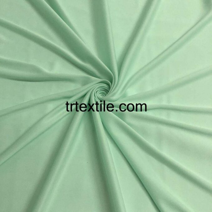 mint green interlock fabric - trtextile.com image