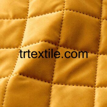 quilted fabric on yellow suede - trtextile.com image